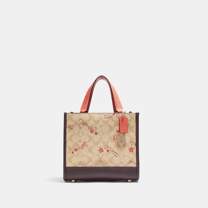 Coach Outlet Dempsey Tote 22 In Signature Canvas With Heart And Star Print Statement Handbags At Unbeatable Discounts Coach Outlet Dempsey Tote 22 In Signature Canvas With Heart And Star Print Statement Handbags At Unbeatable Discounts