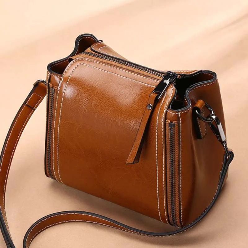 2020 new genuine cowhide women's bag retro versatile messenger bag bucket bag women's fashion shoulder handbag High-End Handbags At Affordable Prices 2020 new genuine cowhide women's bag retro versatile messenger bag bucket bag women's fashion shoulder handbag High-End Handbags At Affordable Prices