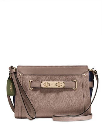 Affordable Bags For Budget Shoppers Coach Swagger Wristlet in Colorblock Pebble Leather The Best Handbag Deals Are Available Now