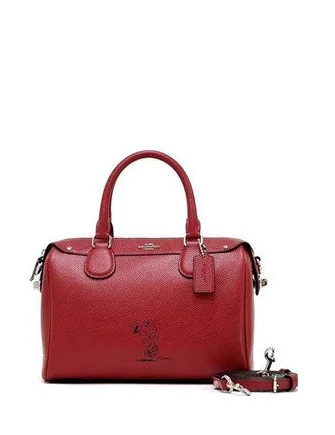Lightweight And Functional Bags For Travel And Work Coach X Peanuts Snoopy Mini Bennett Satchel Chic Shoulder Bags At Promotional Rates