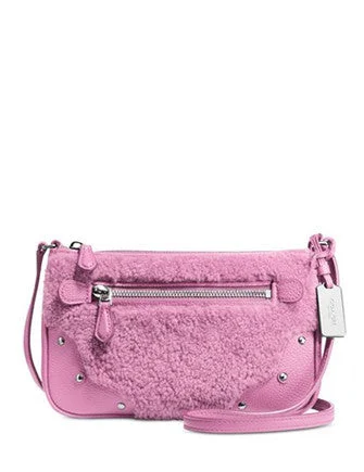 Edgy Bags For Bold And Daring Fashionistas Coach Small Rhyder Pochette in Shearling Grab Stylish Bags Before They Sell Out