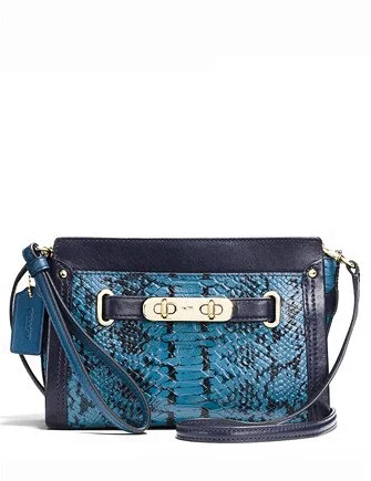 Latest Trends Coach Swagger Wristlet Colorblock Exotic Embossed Leather Best-Selling Bags Now At Exclusive Promotional Prices Latest Trends Coach Swagger Wristlet Colorblock Exotic Embossed Leather Best-Selling Bags Now At Exclusive Promotional Prices