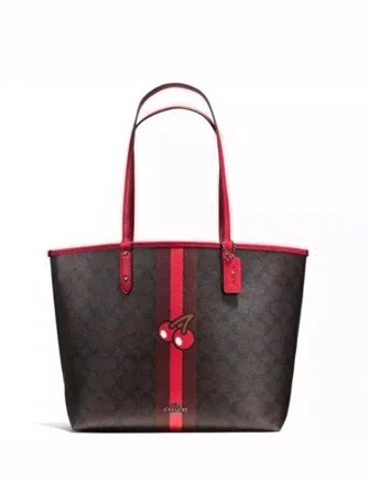 Coach X Pac-Man Cherry Signature Reversible City Tote Designer-Inspired Bags At Reduced Prices Coach X Pac-Man Cherry Signature Reversible City Tote Designer-Inspired Bags At Reduced Prices